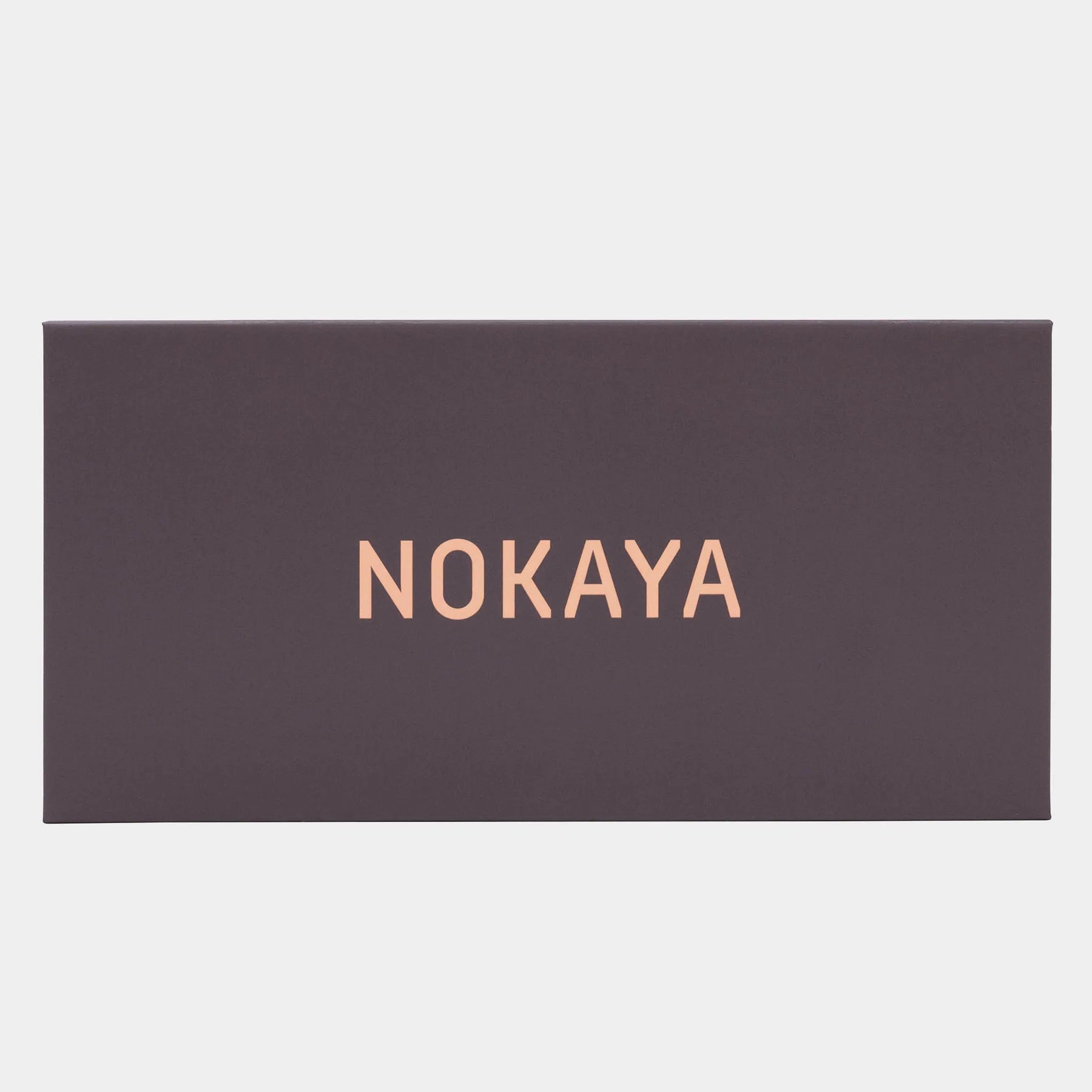 Gift box enhances the luxury experience with its substantial, elegant design.