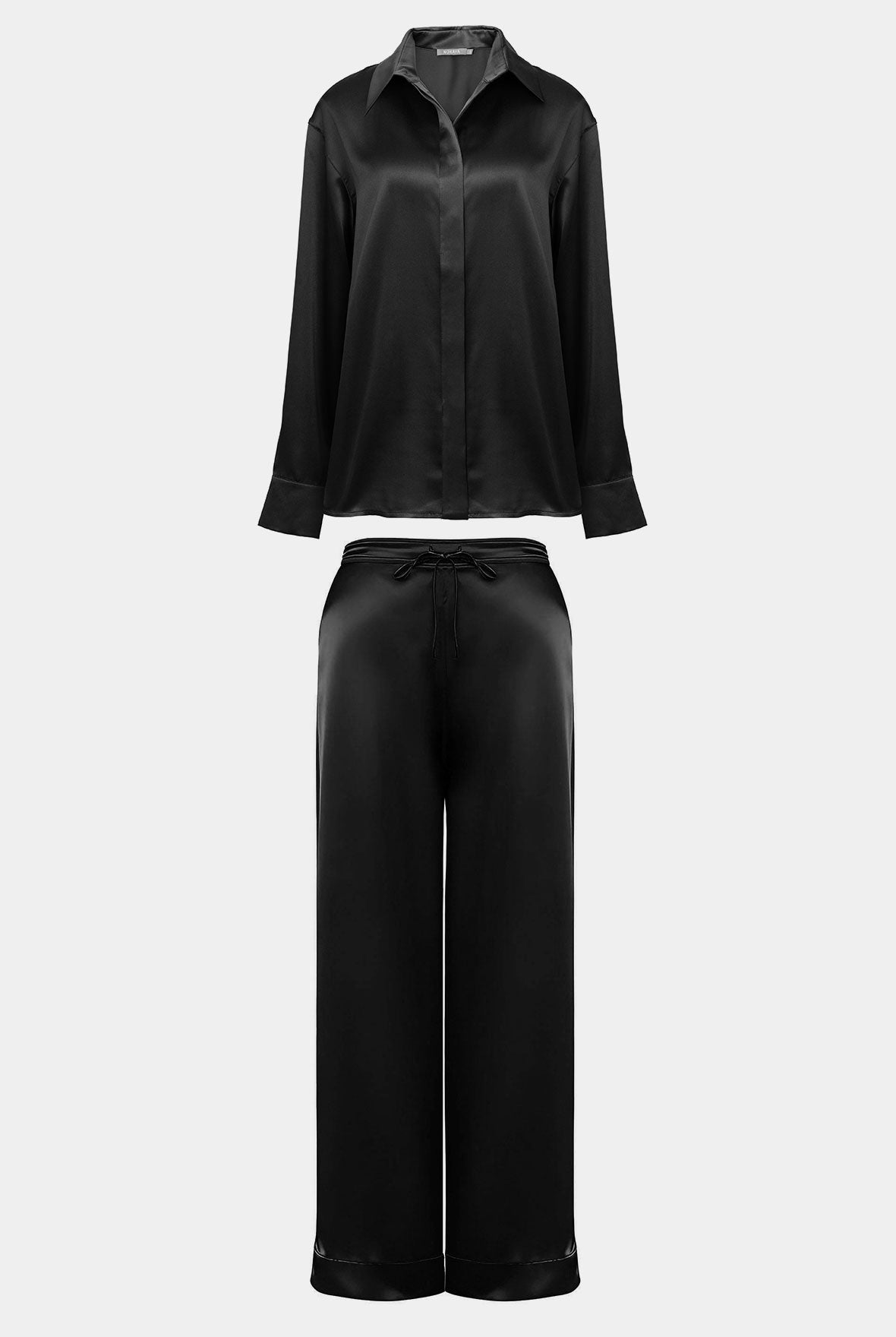 Black silk pyjama shirt and pants set on a white background Nokaya