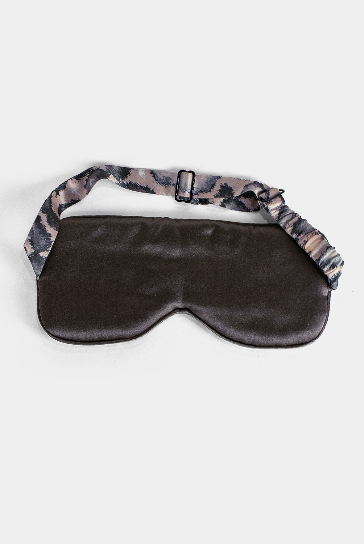 Silk eye mask's reverse side on a white background with animal print trim, Nokaya