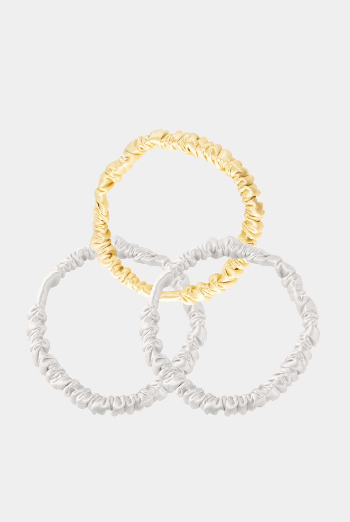 Skinny Silk Scrunchie Set Ivory and Caramel on grey background