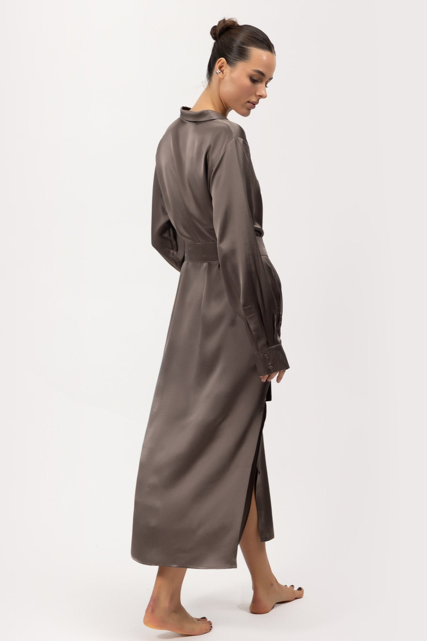 Silk Shirt Dress The Lady by Nokaya, shown from the back in motion, capturing its fluid elegance in Future Brown.