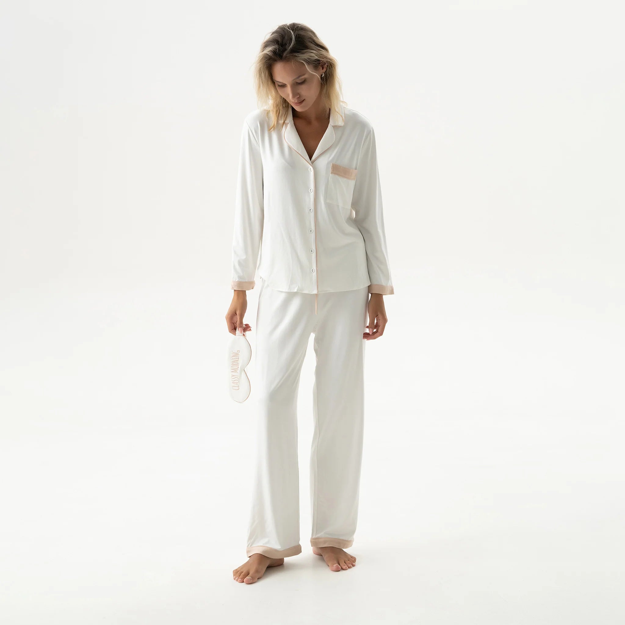 White pyjamas set on the video. Bamboo collection Classy Morning by Nokaya