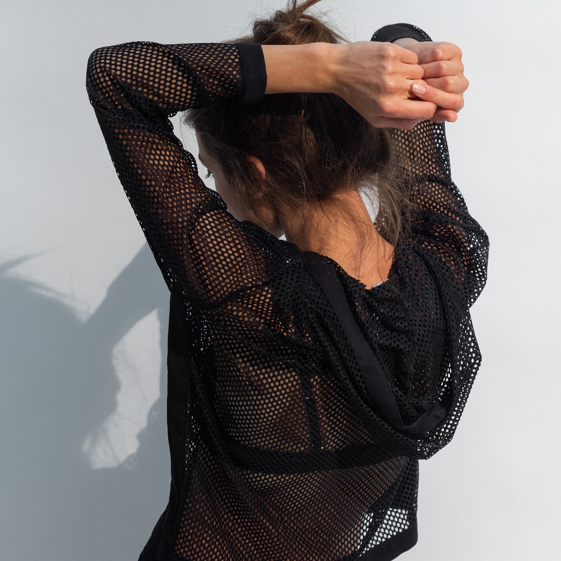 The comfortable and stylish black Daring Net hoodie.