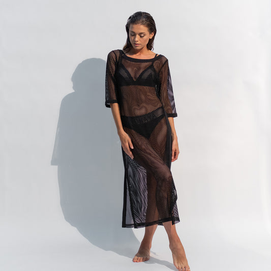 Stylish Daring Net black dress is perfect for layering over a swimsuit.