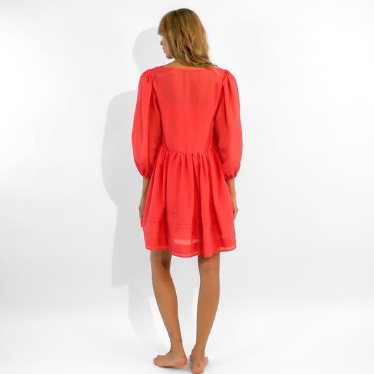 The romantic and sensitive vivid red mini dress. from Nokaya.