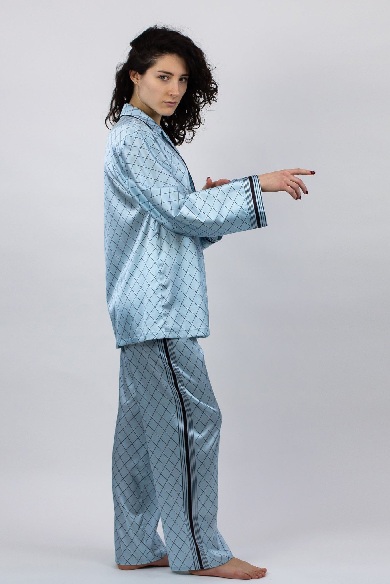 The Lady silk pyjama pants from NOKAYA. Features a relaxed straight cut for night-long comfort.