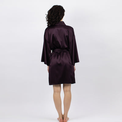 The Lady fudge robe features a relaxed straight cut, wrap style front, a belted waist, a short length and a comfortable fit.
