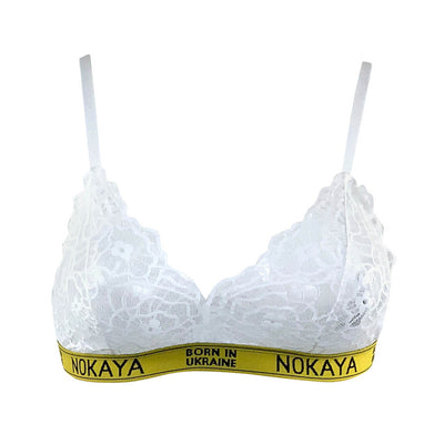 Nokaya modern white lace image bralette highlighted by our signature yellow-black elastic logo tape.